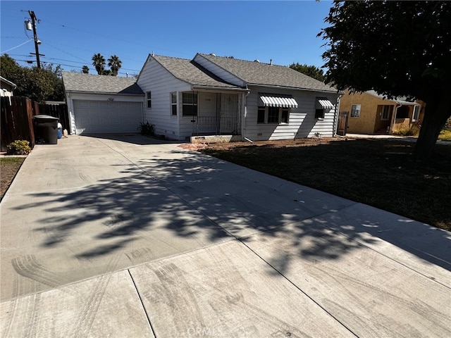 ranch-style home featuring a garage