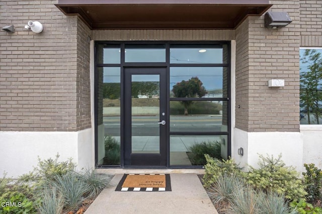 entrance to property featuring french doors