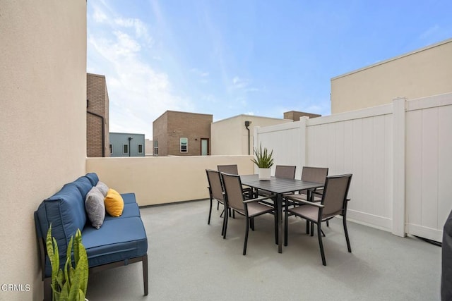 view of patio / terrace with fence and outdoor dining space