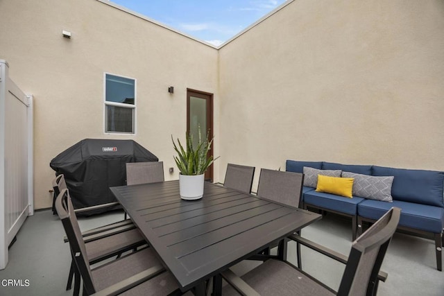 view of patio / terrace featuring outdoor lounge area and a grill