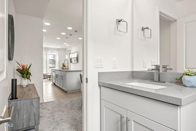 full bath with tile patterned floors, vanity, and recessed lighting