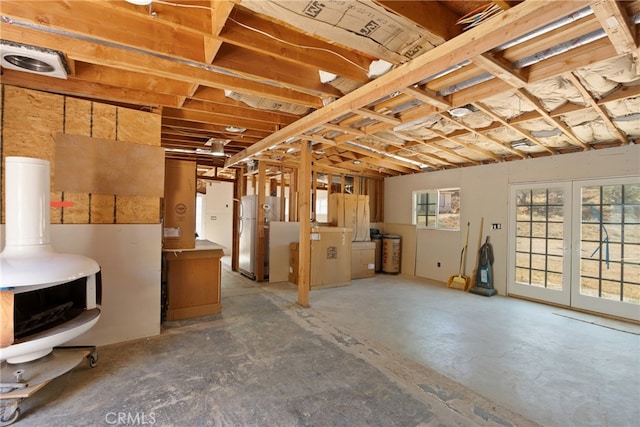 basement featuring white refrigerator