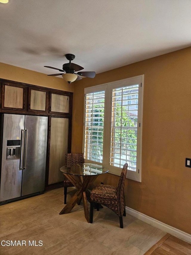 dining room with ceiling fan