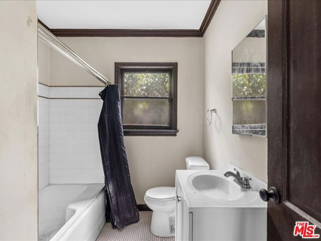 full bathroom featuring ornamental molding, vanity, shower / tub combo with curtain, tile patterned flooring, and toilet