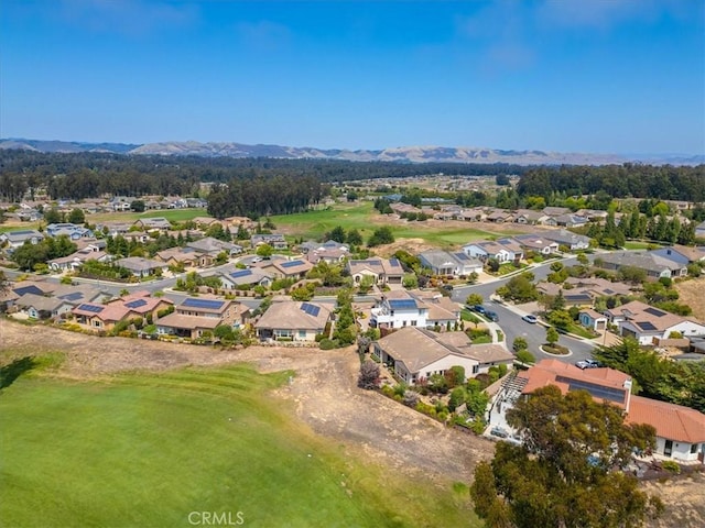 drone / aerial view featuring a mountain view and a residential view