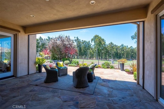 view of patio with fence