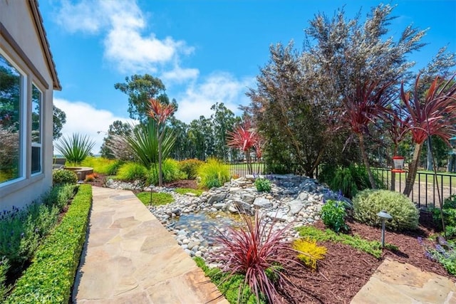 view of yard with fence