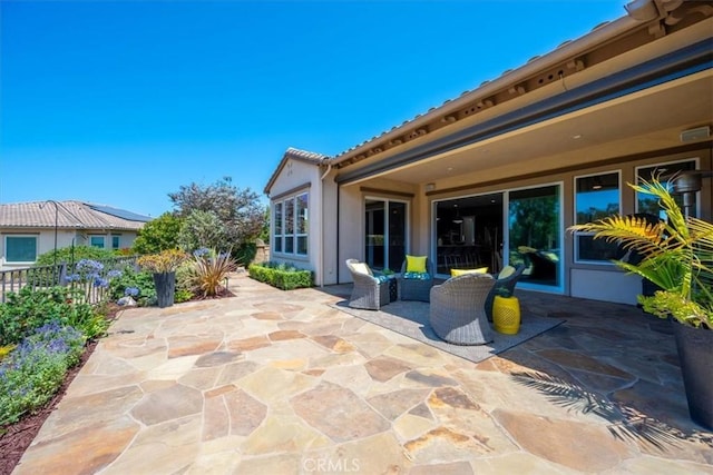 view of patio featuring fence