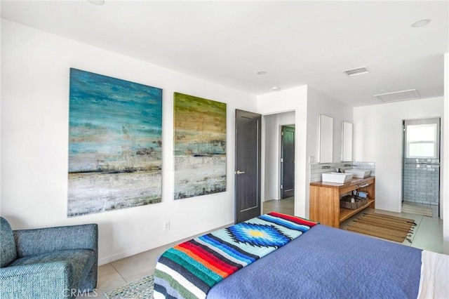 bedroom with baseboards, light tile patterned flooring, and visible vents