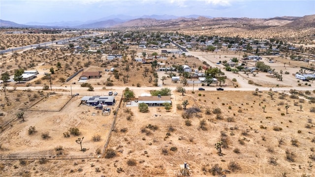 bird's eye view with a mountain view