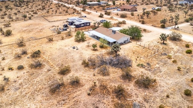 aerial view featuring a rural view and view of desert