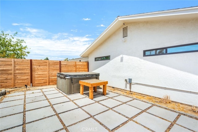 view of patio featuring a hot tub