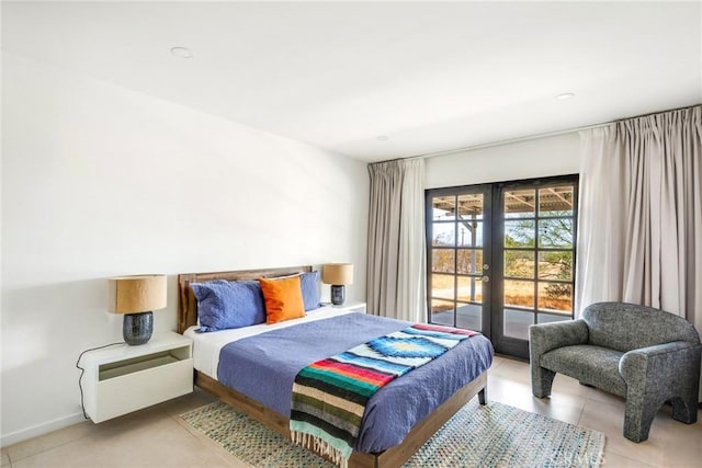 bedroom with tile patterned floors, baseboards, access to outside, and french doors
