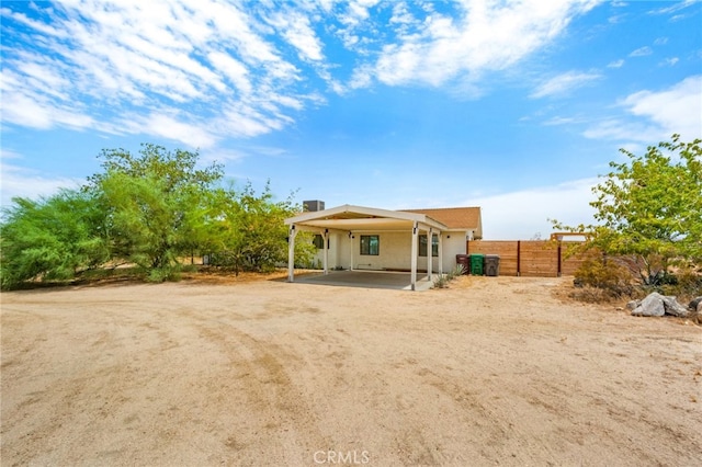 view of front facade featuring a carport