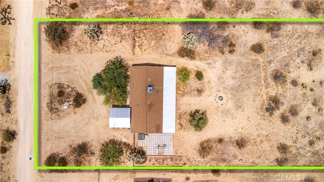 aerial view featuring a rural view and view of desert