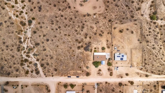 drone / aerial view with a desert view