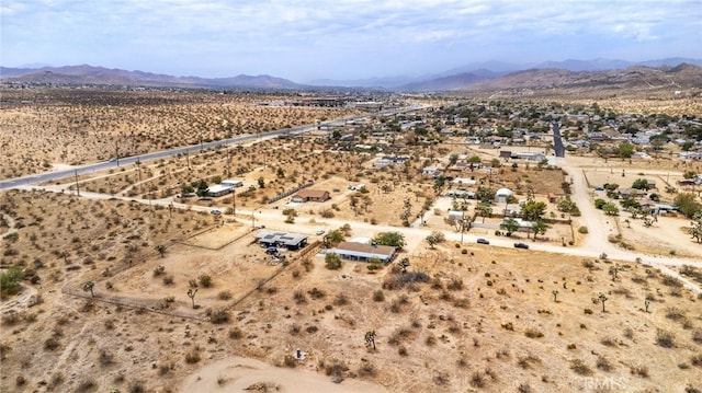 bird's eye view with a mountain view