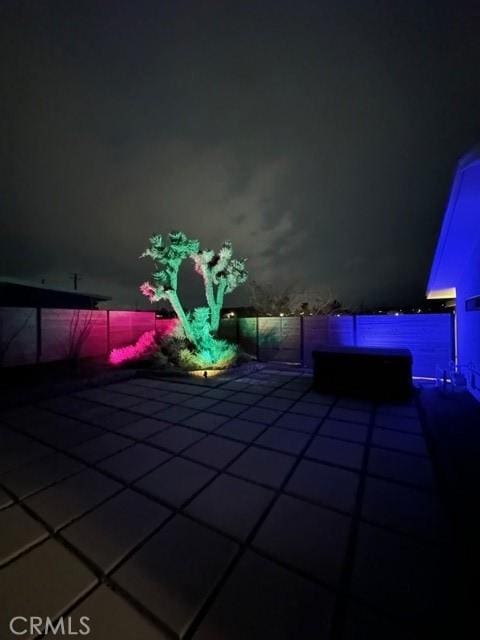 view of pool at night