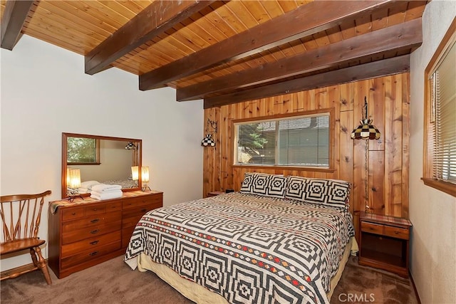 carpeted bedroom featuring beam ceiling, wood walls, and wooden ceiling