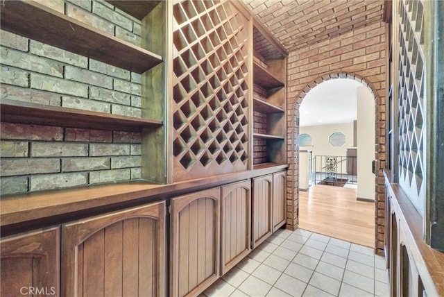 interior space featuring light tile patterned floors