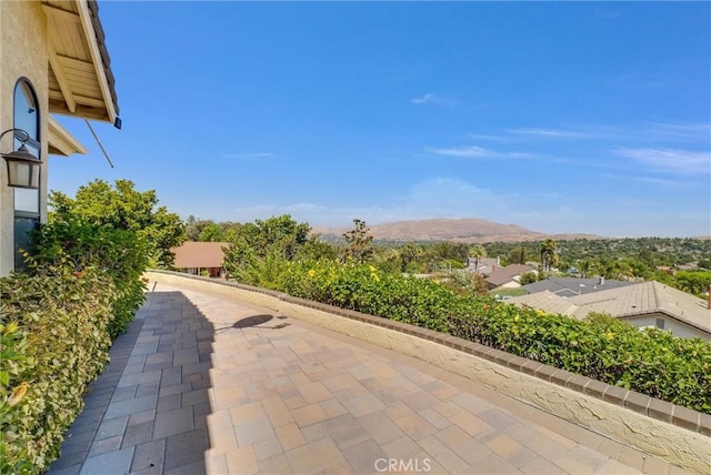 view of patio with a mountain view