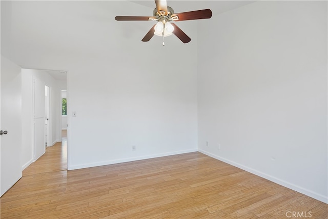 spare room featuring ceiling fan and light hardwood / wood-style floors