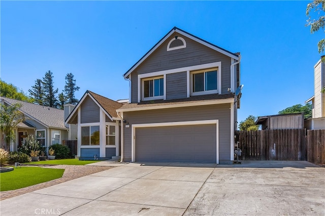 view of front property with a garage and a front lawn