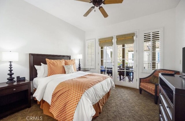 bedroom featuring access to outside, vaulted ceiling, and ceiling fan