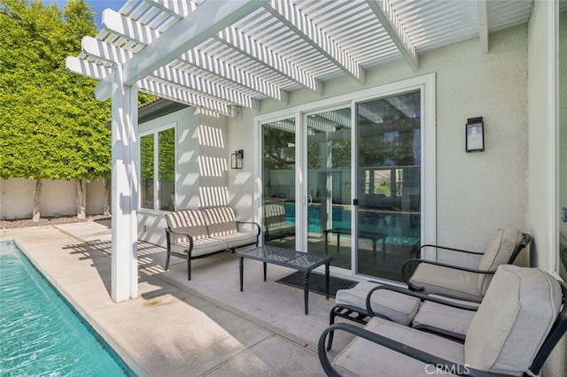 view of patio / terrace featuring a pergola, fence, and an outdoor pool