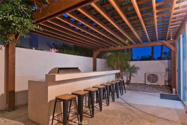 view of patio / terrace featuring ac unit, fence, a pergola, and exterior bar