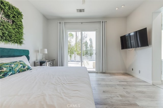 bedroom featuring baseboards, visible vents, light wood finished floors, recessed lighting, and access to outside