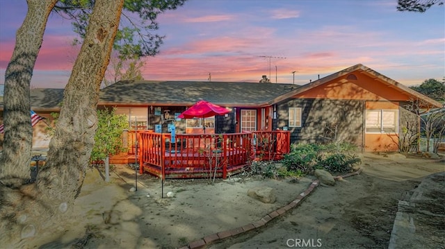 view of front of home featuring a deck