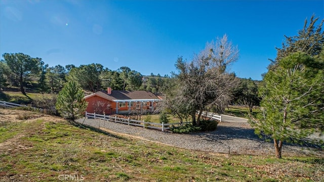 view of yard with a rural view