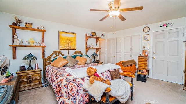 bedroom with light colored carpet and ceiling fan