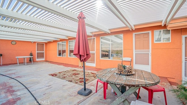 view of patio featuring a pergola