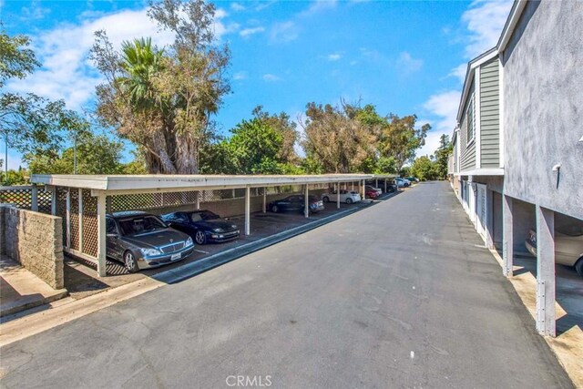 view of car parking featuring a carport