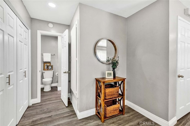 hall featuring dark hardwood / wood-style floors