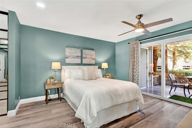 bedroom with ceiling fan, light hardwood / wood-style floors, and access to exterior