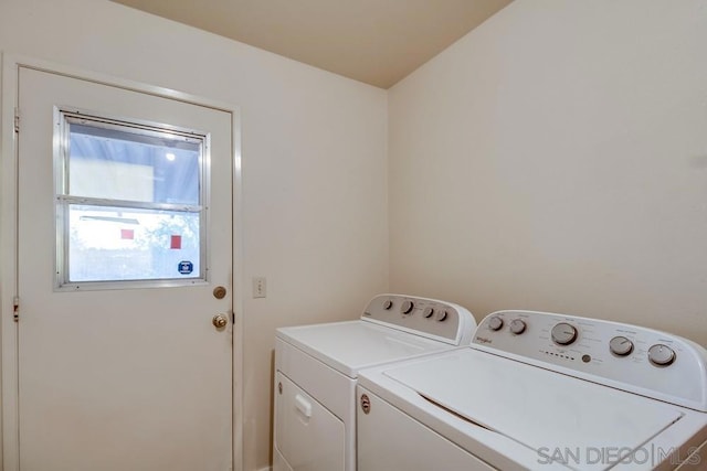 laundry area with washer and clothes dryer