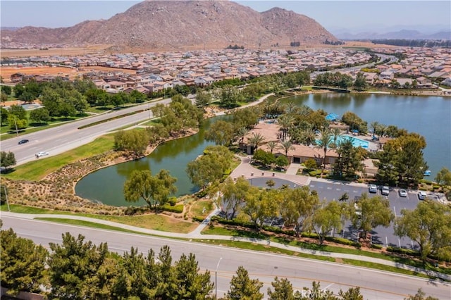 birds eye view of property featuring a residential view and a water and mountain view