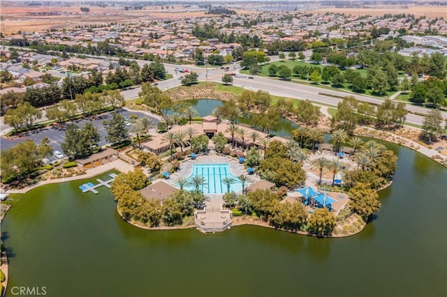 bird's eye view with a water view and a residential view