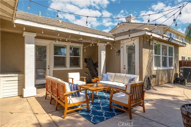 view of patio featuring outdoor lounge area and cooling unit