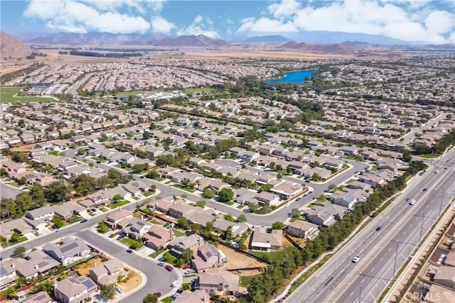 aerial view with a residential view and a water and mountain view