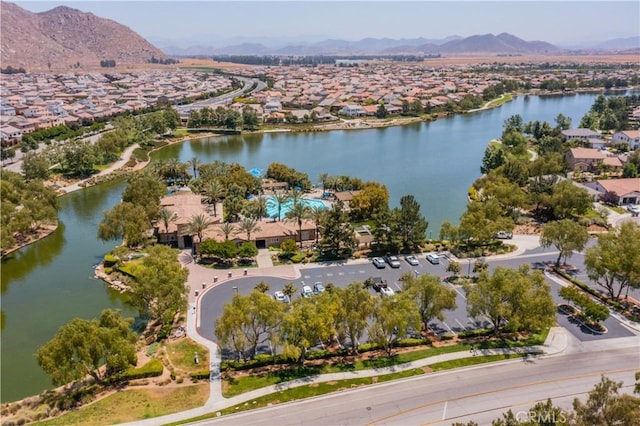 aerial view featuring a residential view and a water and mountain view