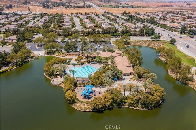 aerial view with a water view and a residential view