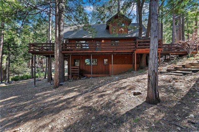 rear view of property with a deck