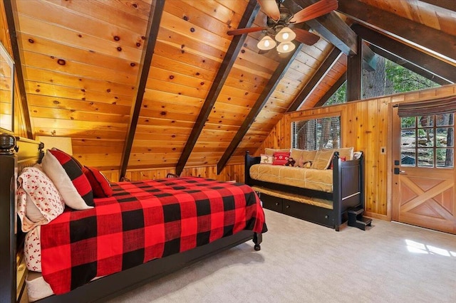 carpeted bedroom with wooden walls, vaulted ceiling with beams, and wood ceiling