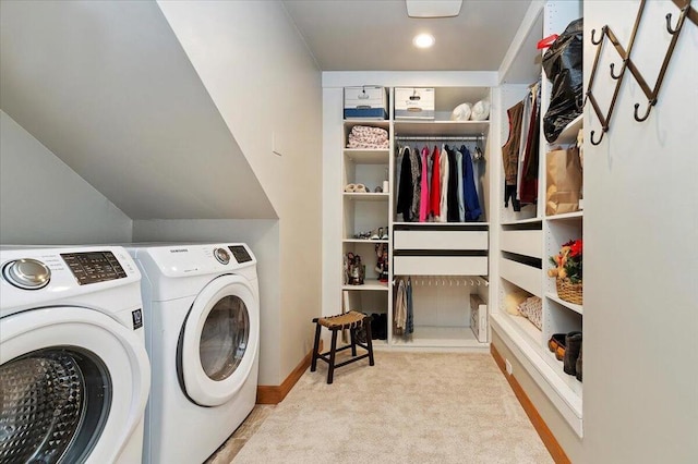 laundry room with light carpet and washing machine and dryer