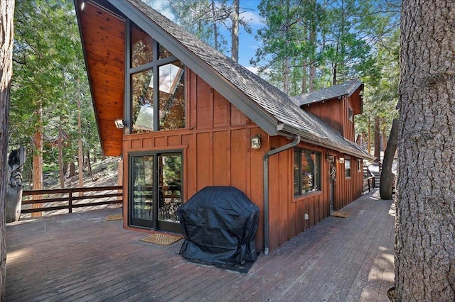 wooden deck featuring area for grilling