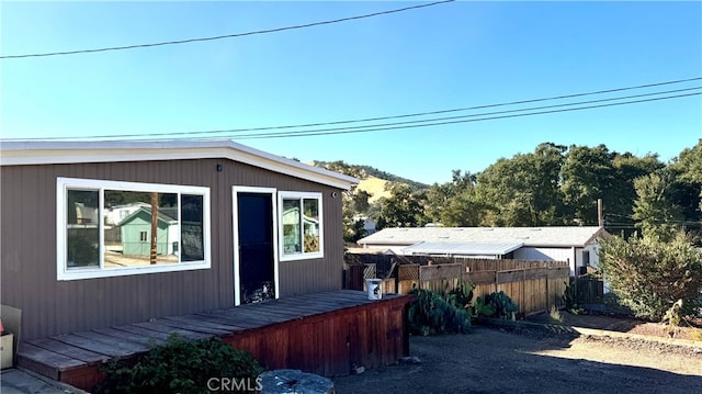 exterior space with a wooden deck